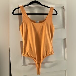Blue Rain Orange bodysuit stretchy material